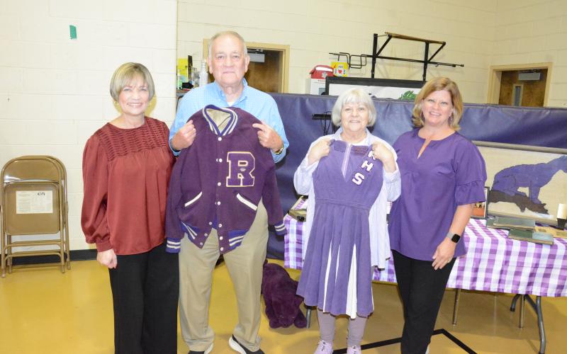 ROYSTON – More than 100 past and current students and faculty members attended the Panther Walk at the old Royston Elementary School Sunday. Everyone who has ever attended elementary or high school in Royston was invited to wander the halls one last time, chat with old classmates and teachers and to find their picture in old yearbooks. History was on display, including the Royston High School letterman jacket of Ed Burton and the cheerleading outfit of Sherry Eason. These items, along with other memorabilia