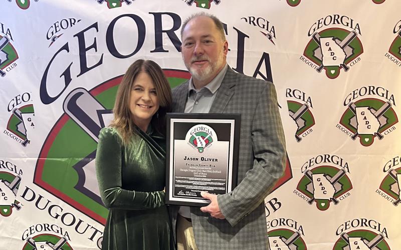 Jason Oliver (with wife Candace) was inducted to the Georgia Dugout Club’s Softball Hall of Fame Saturday at a ceremony at the Renaissance Waverly Hotel in Atlanta.