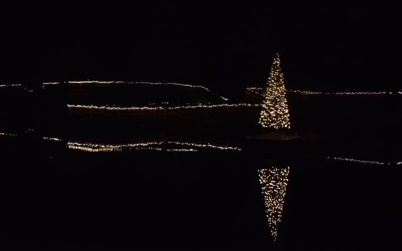 FRANKLIN SPRINGS – A Christmas tree set up in the middle of a pond at Victoria Bryant State Park has brightened the park this holiday season. Franklin County citizens are celebrating Christmas this week. Several shared memories of past holidays for this week’s issue. See Page 10. (Photo by Scoggins)