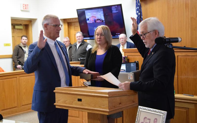 Franklin County Sheriff-elect Scott Andrews (left) was sworn in to the post in a ceremony Friday at the Franklin County Courthouse.