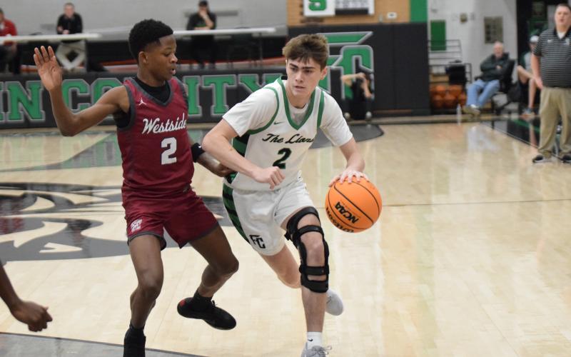 Chandler Coulter drives toward the basket in action earlier this season.