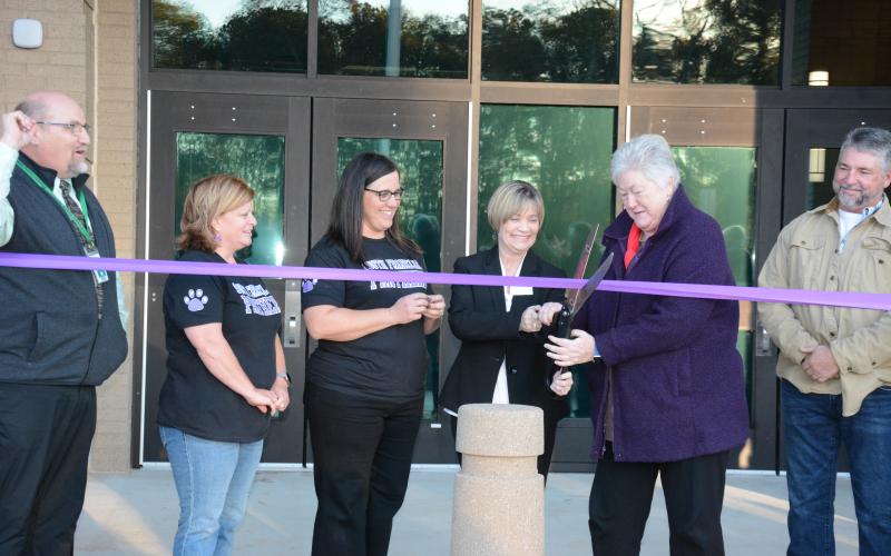 South Franklin Elementary School Assistant Principal Natalie Erskine (from left) and Principal Jamie Hammock look on as Franklin County Schools Superintendent Melanie Burton-Brown and Board of Education Chair Robin Cato cut the ribbon on the new school Thursday just south of Carnesville. (Photo by Eavenson)