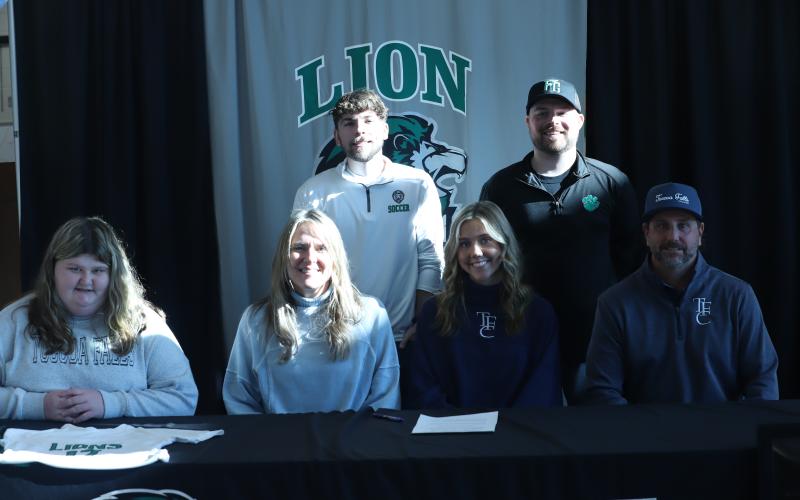 Haleigh Beard signed a soccer scholarship to play for Toccoa Falls College next year. Pictured at the ceremony Thursday at FCHS are (front, from left) sister Haven Beard, mom Melissa Beard, Haleigh, dad Ryan Beard, (back) Assistant Coach Chandler Childs and Head Coach Conner Irvin. (Photo courtesy of Franklin County High School)