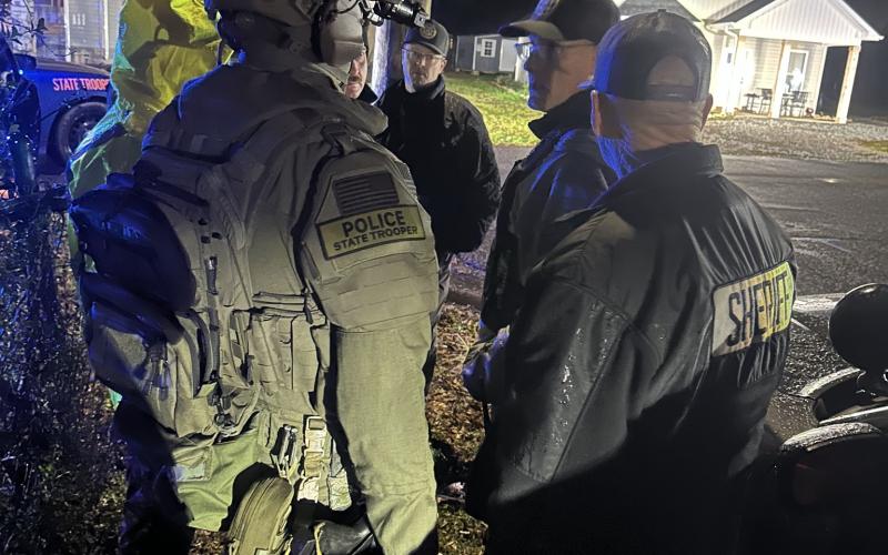 Sheriff Scott Andrews talks with officers during a standoff with a suspect at a home on Rainbow Drive in Lavonia. (Photo courtesy of the Franklin County Sheriff’s Office)