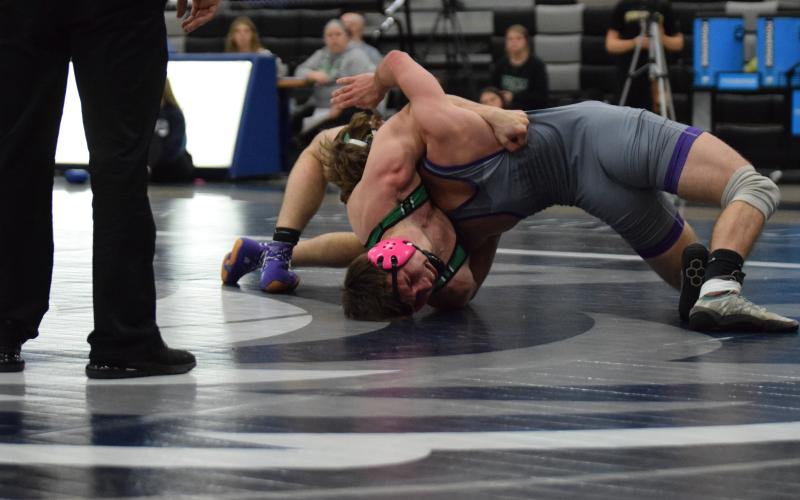 Lion Zane Puff works to turn a Union County opponent during the Area 8AA Duals Tournament. (Photo by Scoggins)
