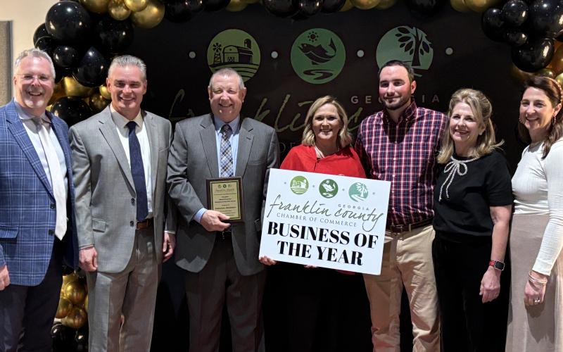 Emmanuel University was honored with the Franklin County Chamber of Commerce’s Bruce Knighton Award for Business of the Year during the annual Gala and Awards Banquet last week at the Swails Center. Pictured are Brian James, Matt McRee and President Greg Hearn of Emmanuel University, Chamber President Cyndee Phillips and Knighton family members Susan, Lacey and Vic. (Photos by Scoggins)