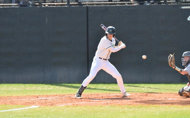 Franklin County High School senior baseball player Ty Peeples watches a ball go while taking his state record-setting 111th walk of his high school career. (Photo by Scoggins)