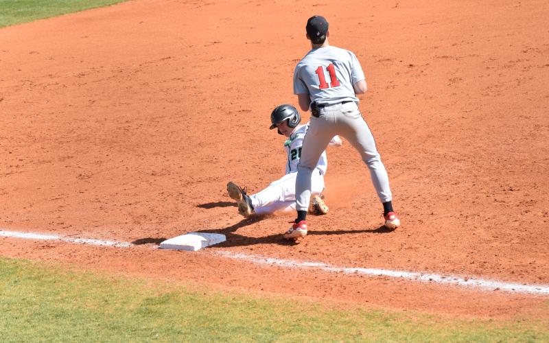 Parker Moorhead slides into third with a triple against Sonoraville Saturday in Carnesville. (Photos by Scoggins)