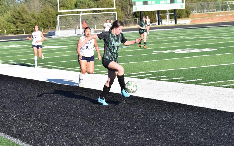 Brooke Davitt dribbles downfield in the Franklin County Lady Lions’ contest against East Jackson Tuesday in Carnesville.