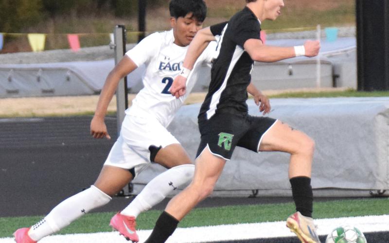 Eli Cooling drives toward the net before scoring a goal Tuesday in a victory over East Jackson in Carnesville. (Photos by Scoggins)
