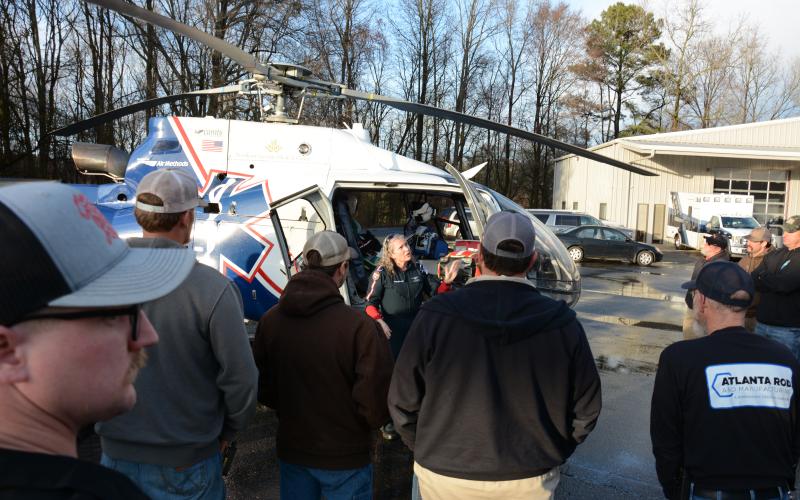 The volunteer fire departments for Carnesville and Red Hill came together Monday for training on how to deal with helicopter medical transport from the scene of a medical emergency.