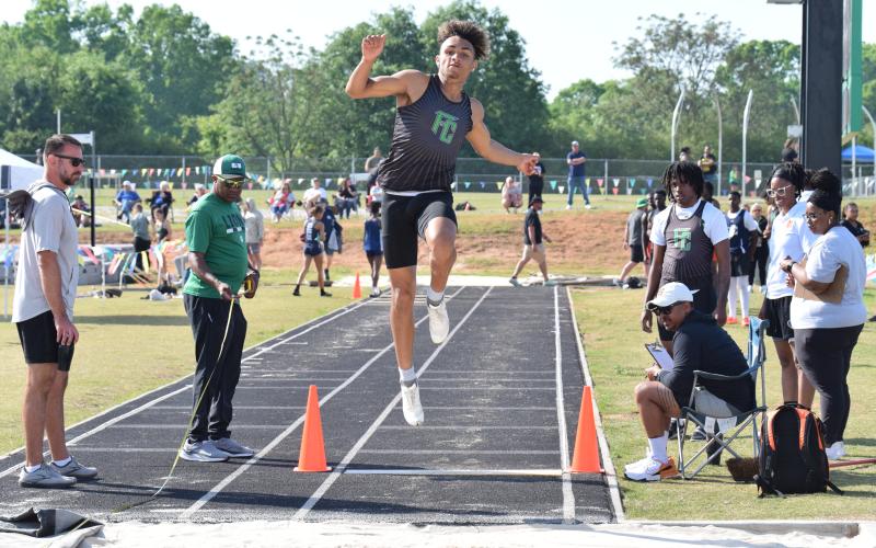 Franklin County track athletes Candler Stone, Megan Hightower, TaKiaha Winkfield and Nava Ware (above) won multiple Region 8AA championships Saturday at Jeff Davis Field at Ed Bryant Stadium. (Photos by Scoggins)
