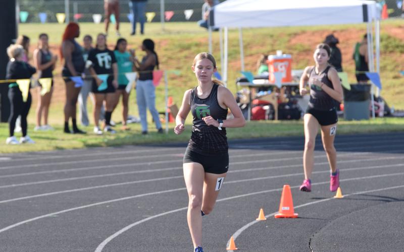 Franklin County track athletes Candler Stone, Megan Hightower (above), TaKiaha Winkfield and Nava Ware won multiple Region 8AA championships Saturday at Jeff Davis Field at Ed Bryant Stadium. (Photos by Scoggins)