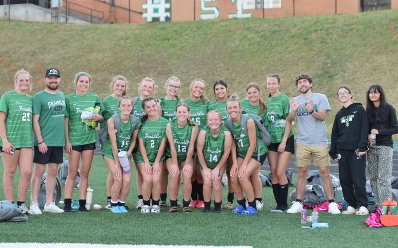 The Franklin County Lady Lions pose for a team photo after securing the team’s first state playoff berth in 21 seasons Friday night with a 5-1 win over Hart County in Carnesville.