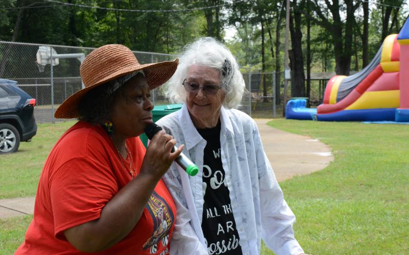 LAVONIA – Franklin County Juneteenth event organizer Linda Barnes (left)  talks with long-time Lavonia resident LaNora Andrews Saturday at the federal holiday’s ceremony held at Spring Street Gym in the Springview Heights community. Andrews recalled when she was given the key to the gym. Other speakers and a history presentations were made during the event.