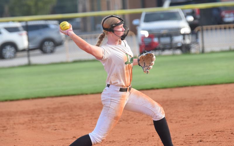 Lady Lion third baseman Brailey Randall makes a throw to first in a victory over Rabun County last week in Carnesville. Randall and the Lady Lions have four non-region games left before the start of the 8AA scheduled Tuesday. (Photo by Shane Scoggins)