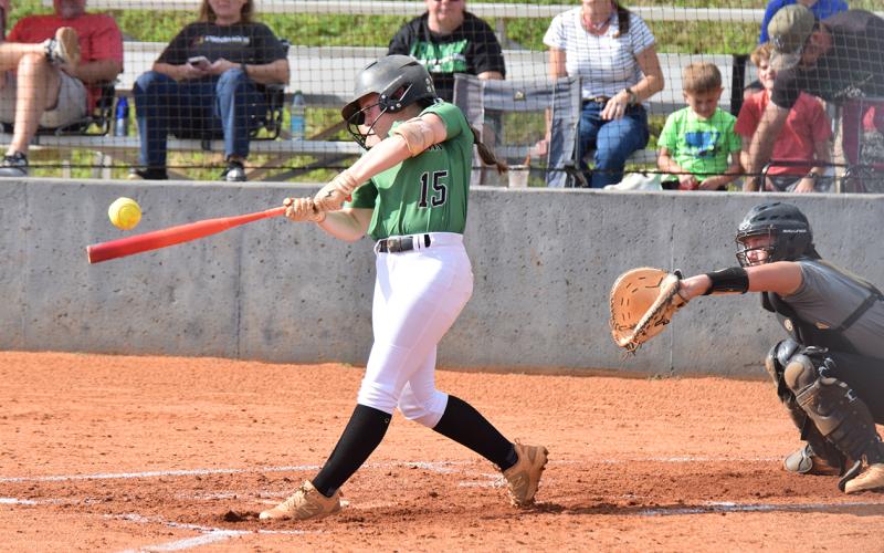 Hayden McGee gets one of her four hits in a doubleheader Friday against Commerce and Madison County at Franklin County High School. The Lady Lions swept their two games by a combined score of 24-5. (Photo by Shane Scoggins)
