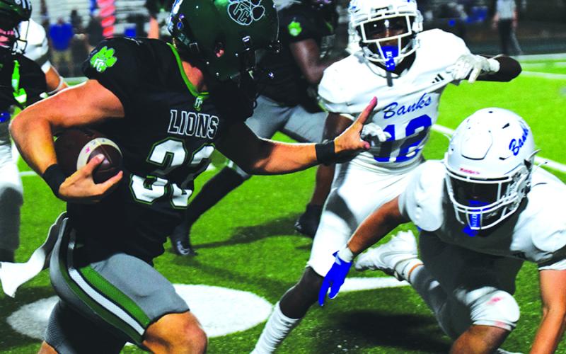 Franklin County quarterback Keyes Harbin will lead the Franklin County Lions to Westminster, S.C., to face the West-Oak Warriors Friday night.