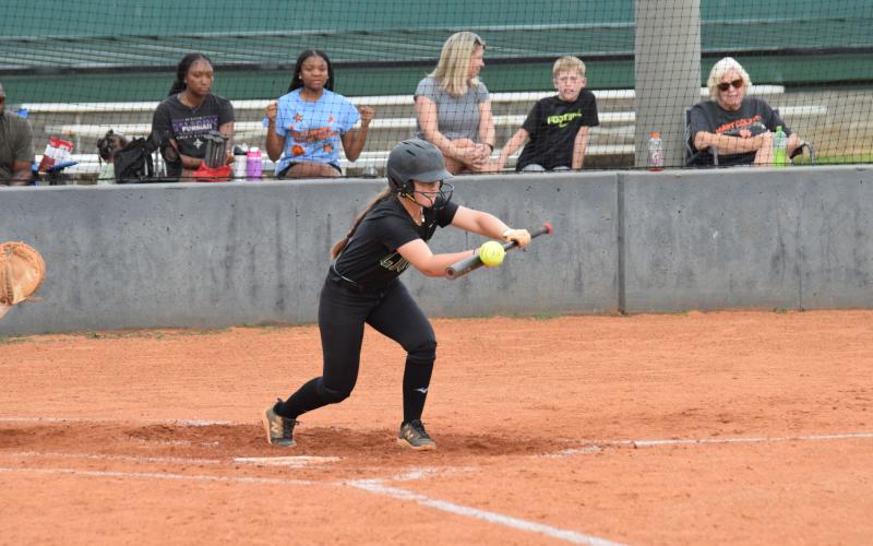 Ella Kinder lays down a bunt in a Franklin Fastpitch game against Hart County Thursday in Carnesville. (Photo by Shane Scoggins)