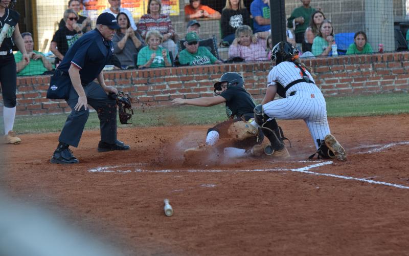 Willow Morgan slides in safely to score a run against Hart County last week in the first round of the state tournament. (Photos by Shane Scoggins)