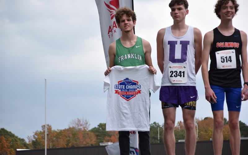Gipson won the state Class AA cross country championship in Carrollton with a time of 17:09.6 on the 3.2-mile (5K) course.