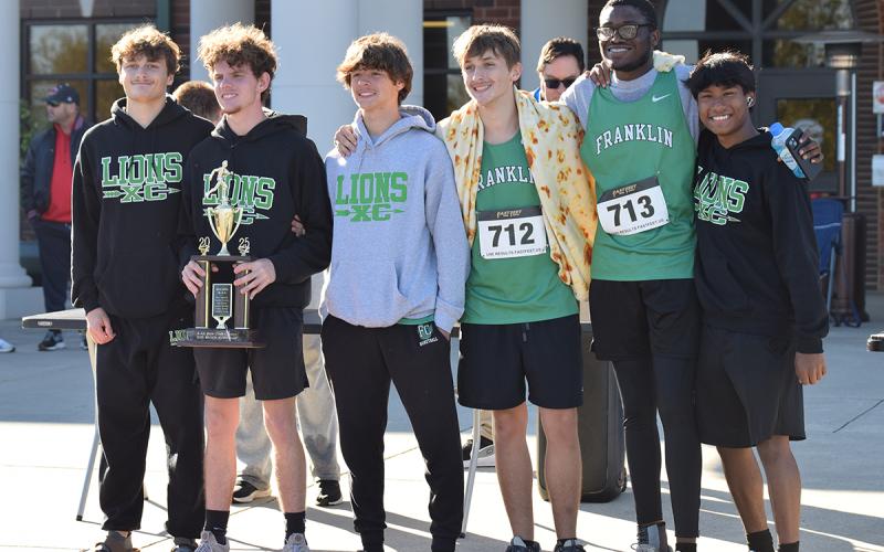 The Franklin County Lions (above) took second place in Region 8AA Saturday at the State Sectional Meet. Among those running for the Lions were (above, from left) Evan Locke, Will Gipson, Connor Borum, Justin Whitmire, Trey Willis and Angel Zamora.