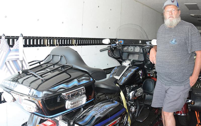 Richard Roberts, pictured with the motorcycle he rode as a Patriot Guard Rider, will be honored Saturday with the Ride for Richard.