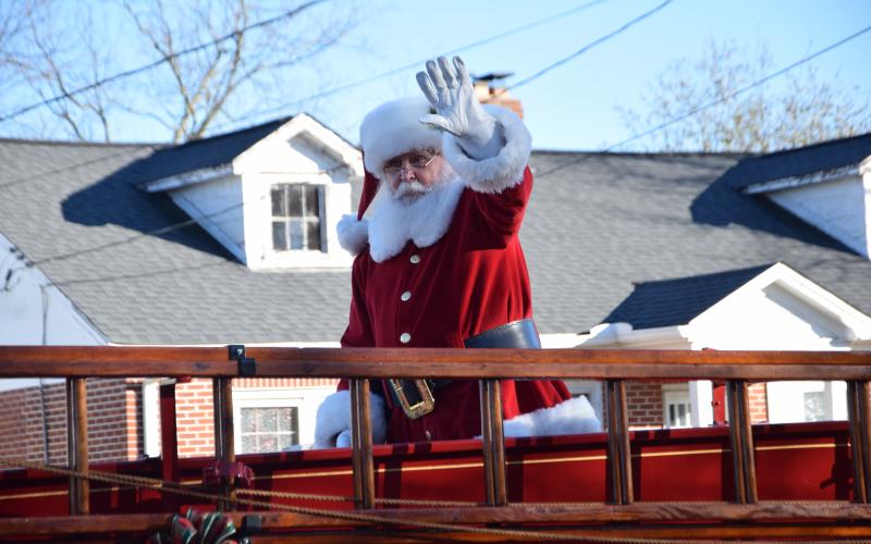 Santa Claus waves to the crowd at the Royston Christmas parade earlier this holiday season.