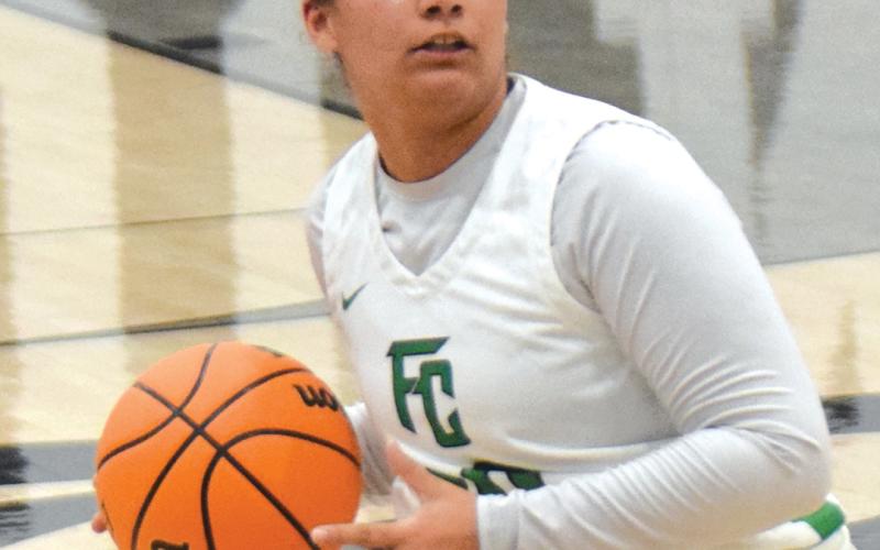 Lady Lion Kallie Thrift looks to make a pass in a game earlier this season.