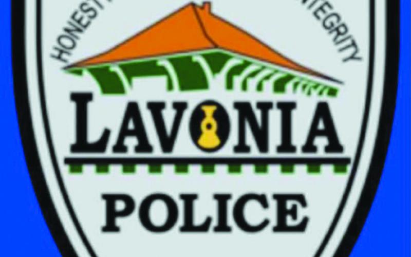 A tag cover violation led to the recovery of a stolen vehicle and three arrests on a host of charges, including for drug offenses.