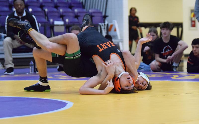 Lion Trey Silva stretches out a Hart County opponent in the Area 8AA Duals Championship round Saturday in Blairsville. (Photo by Shane Scoggins)