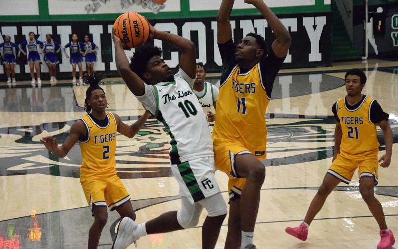 Jeremiah Mayfield goes up for a shot during Franklin County's win over Washington-Wilkes Wednesday in the Lions' Den.
