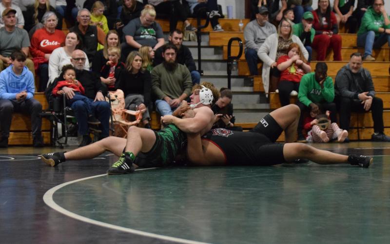Lion Ramsey Fulbright pins a Rabun opponent in a match earlier this season.