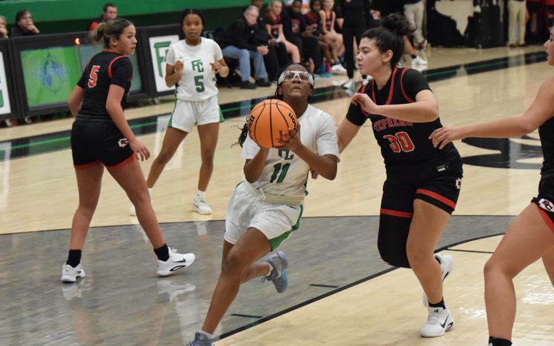 Freshman Jyhia Sturghill drive to the basket for a layup Tuesday against Stephens County. (Photo by Shane Scoggins)