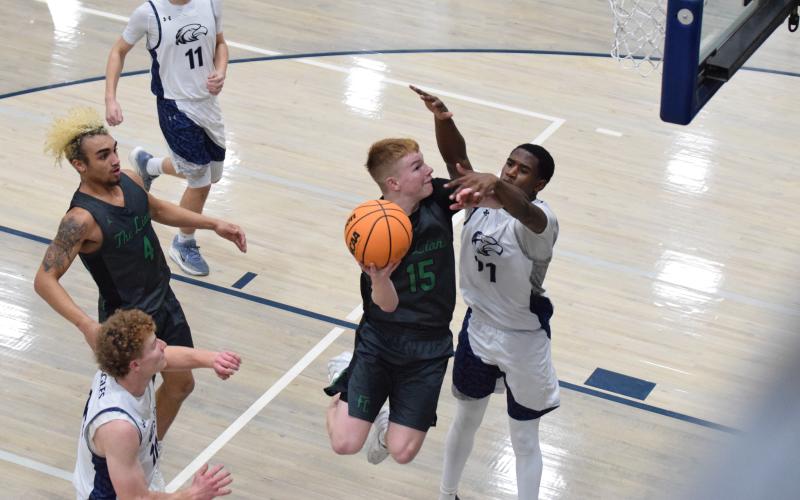 Hudson Huff goes up for a layup against East Jackson Thursday in Franklin County’s win in Commerce.