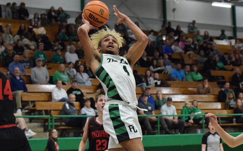 Lion senior Nava Ware goes up to score in Franklin County’s win over Stephens County Tuesday in the Lions’ Den. (Photo by Shane Scoggins)
