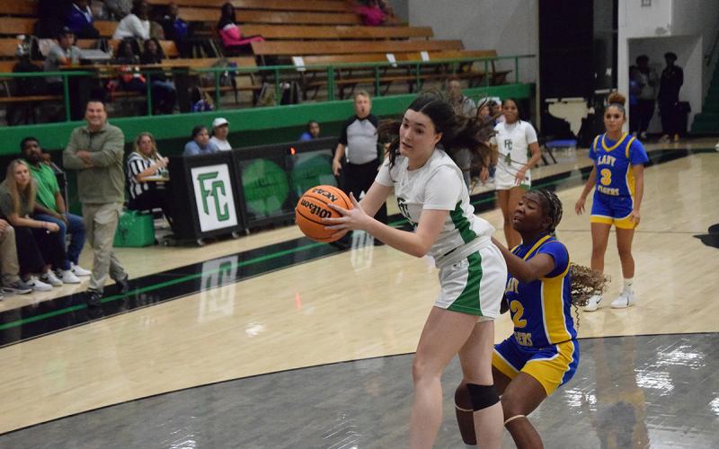 Avery Burton grabs a rebound in a Lady Lions win over Washington-Wilkes Wednesday in the Lions' Den.