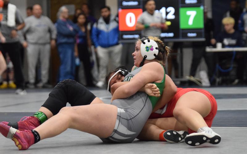Lady Lion Hannah Crowe avenged a third place finish in her area tournament by defeating the area champion and the wrestler that defeated her at area to win the State Sectional tournament Friday in Commerce. (Photos by Shane Scoggins)