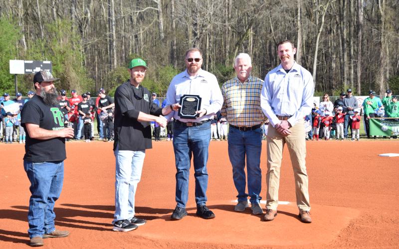 A plaque was presented by Franklin Little League President Daniel Griffin to Lavonia Mayor Courtney Umbehant, City Manager Robert Ogburn and City Council Member Andrew Murphy in celebration of the 25th year of Lavonia being home to Franklin County Little League.