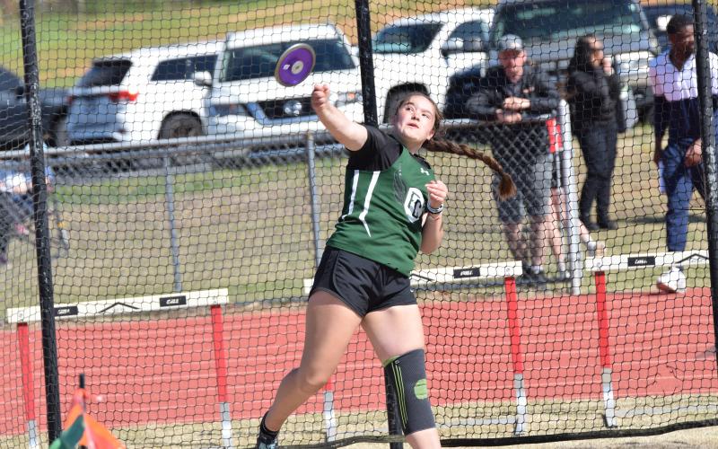 Carly Tanner makes  a throw in the discus event at the NEGIAA Region Championship Tuesday in Danielsville. Tanner won the discus and shot put to help lead the Lady Cubs to a region championship. (Photo by Shane Scoggins)