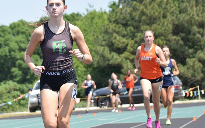 Franklin County’s Savannah Jackson led the Lady Lions to the Region 8AA track championship. Jackson won the 800, 1,600 and 3,200 and also placed in a relay event to earn the track meet’s High Points Trophy. (Photo by Shane Scoggins)