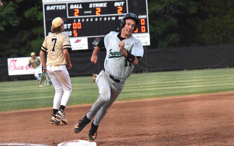 Senior Caden Cawthon rounds third on his way to score one of Franklin County’s 29 runs in a two-game sweep of Thomson Thursday in the second round of the state playoffs. (Photos by Shane Scoggins)