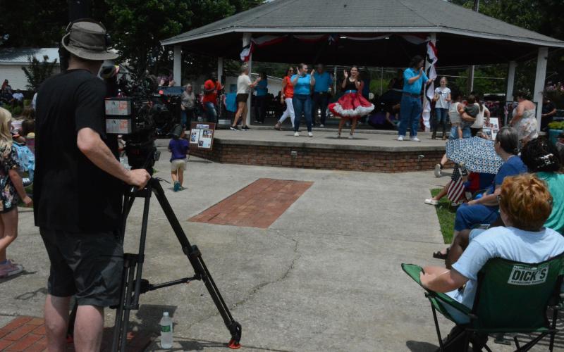A crew from the BBC was in downtown Lavonia last week for a performance by Zeb Ross and the J Creek Cloggers at the Gazebo.