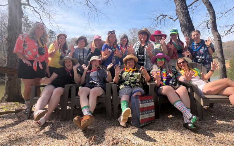 Taking part in a scrapbooking retreat on Lake Hartwell earlier this year were (front, from left) Helena Barfield, Emma Barfield, Nancy Rowland, Darlene Eades, Michelle Covel, (back) Kelly Barfield, Karen Turner, Tonya Bunch, Donna Ialungo, Debbie Tardella, Donna Goenner, Cheyney Morgan, Andrea Raphael, Victoria Richardson and Audrey Covel.