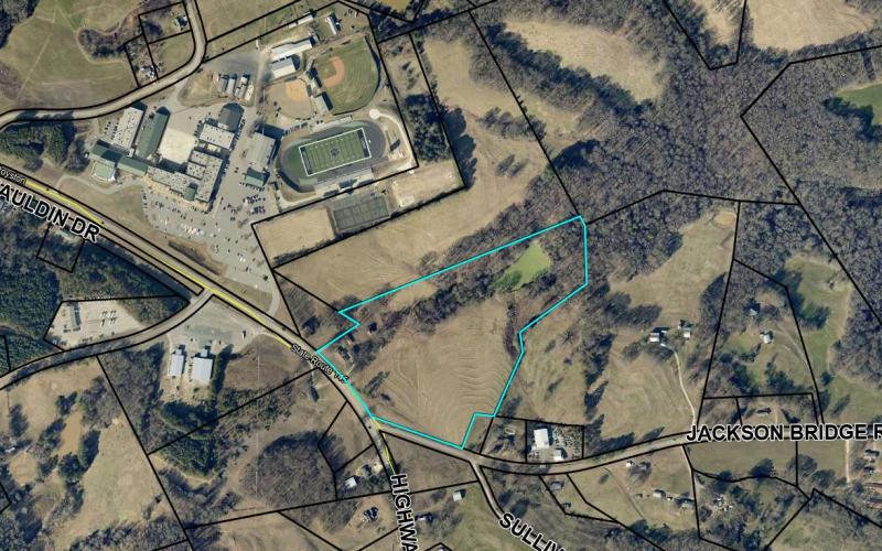 The Franklin County Board of Education voted Thursday to buy 21.54 acres to add to the campus at FCHS.