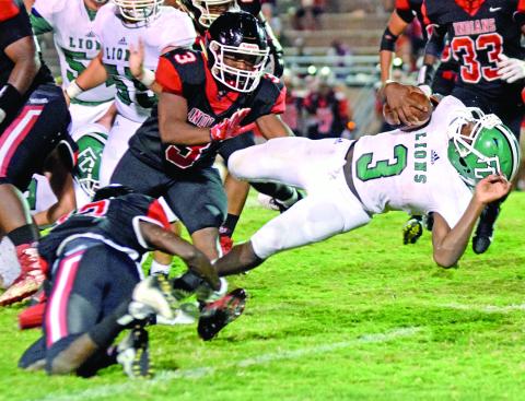Lion back C.J. Hall dives for extra yards in action Friday at The Reservation in Toccoa. (Photos by Rose Scoggins)