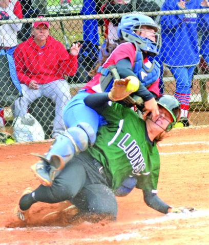 Seniors Kalyn Jinks (sliding in safely during last year's state semifinals), Kaleigh Fowler and Jaden Cheek will be counted on for leadership as the Franklin County Lady Lions set out to defend their Class AAA state championship.