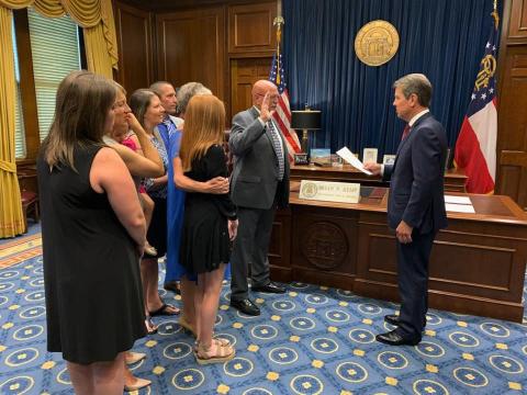 Lavonia Police Chief Bruce Carlisle is surrounded by family as he his sworn in as the Georgia Association of Chiefs of Police (GACP) representative on the Board of Public Safety by Gov. Brian Kemp on Aug. 29. Carlisle is serving a three-year term and was appointed to the position by both Gov. Nathan Deal and Gov. Kemp.