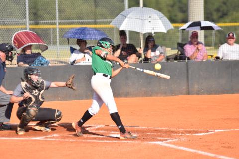 Jayden Gailey gets one of her hits during Wednesday's game against Jackson County.