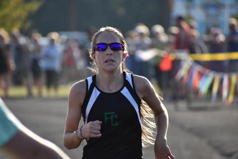Middle school cross country region champion Ansley Moore
